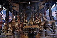 Kathmandu Patan Golden Temple 28 The Entrance Door To The Swayambhu Chaitya Is Guarded By Two Snow Lions And Has A Vajra And Many Statues Including The King And Queen